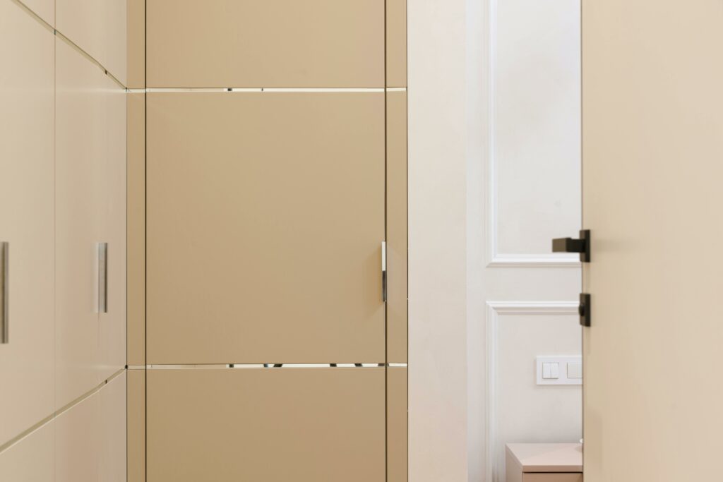 pexels photo 6636321 6636321 Beige colored doors and wardrobe in hallway of contemporary apartment with minimalist design